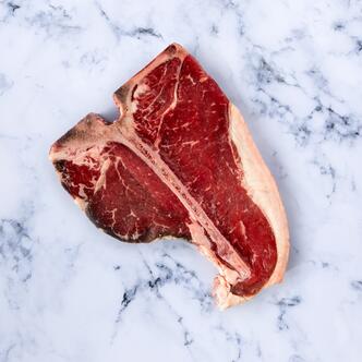 porterhouse steak on marble background