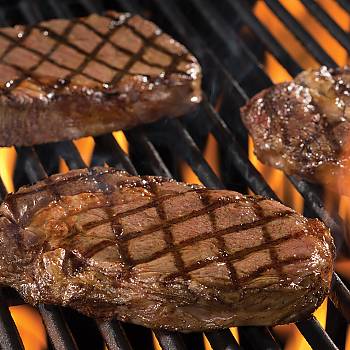 "Tangy & Sweet" Ribeyes in a Pomegranate and Wine Marinade Recipe