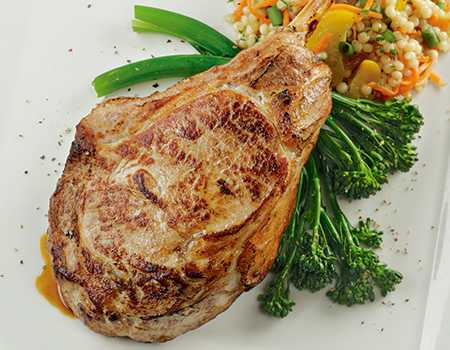 Grilled Veal Chop with Herbed Butter